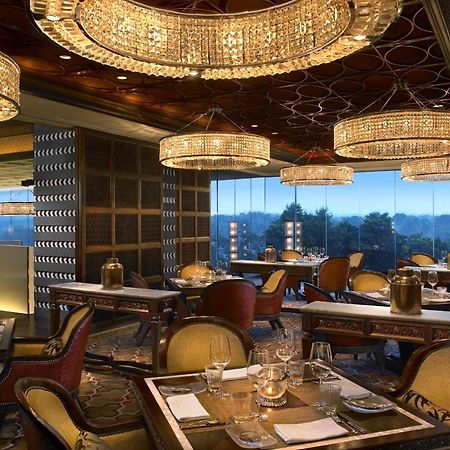 The Leela Ambience Gurugram Hotel & Residences - The Luxury Urban Sanctuary Gurgaon Restaurant photo The interior of the restaurant