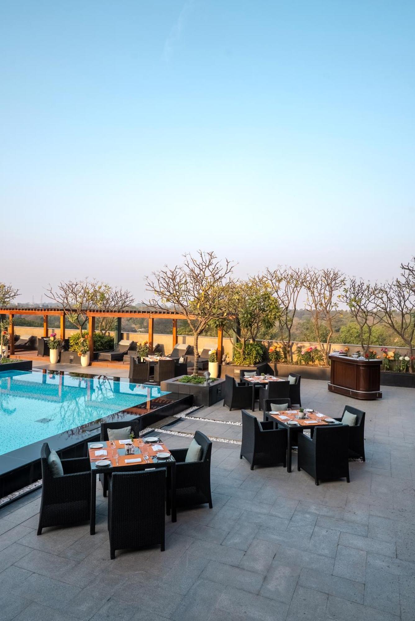 The Leela Ambience Gurugram Hotel & Residences - The Luxury Urban Sanctuary Gurgaon Exterior photo The Park, New Delhi